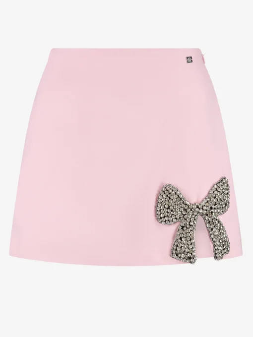 Aansluitende skort met glitter strik
