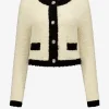 Fluffy vest met sierknopen