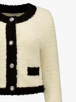 Fluffy vest met sierknopen