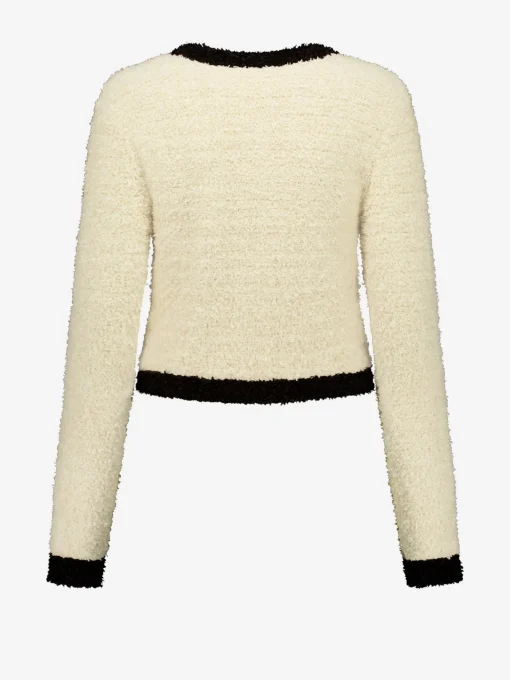 Fluffy vest met sierknopen