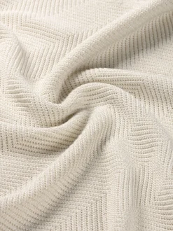 Ajour gebreide top met pofmouwen