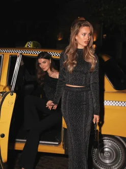 Korte glitter top met col en logo patroon