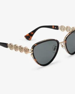 Vlindervormige zonnebril met goudkleurige details